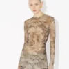 Den beige Madaillon-topper