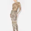 Den beige Madaillon-topper