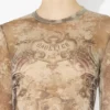 Den beige Madaillon-topper