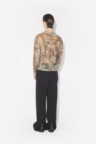 Den oversized beige Madaillon-topper
