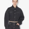 Den svarte denimjakken med stropper Den svarte denimjakken med stropper