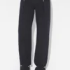 Denimjeans med trykknapper Denimjeans med trykknapper