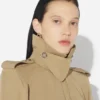 Trenchcoats with cut-outs Trenchcoats with cut-outs