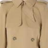 Trenchcoats with cut-outs Trenchcoats with cut-outs